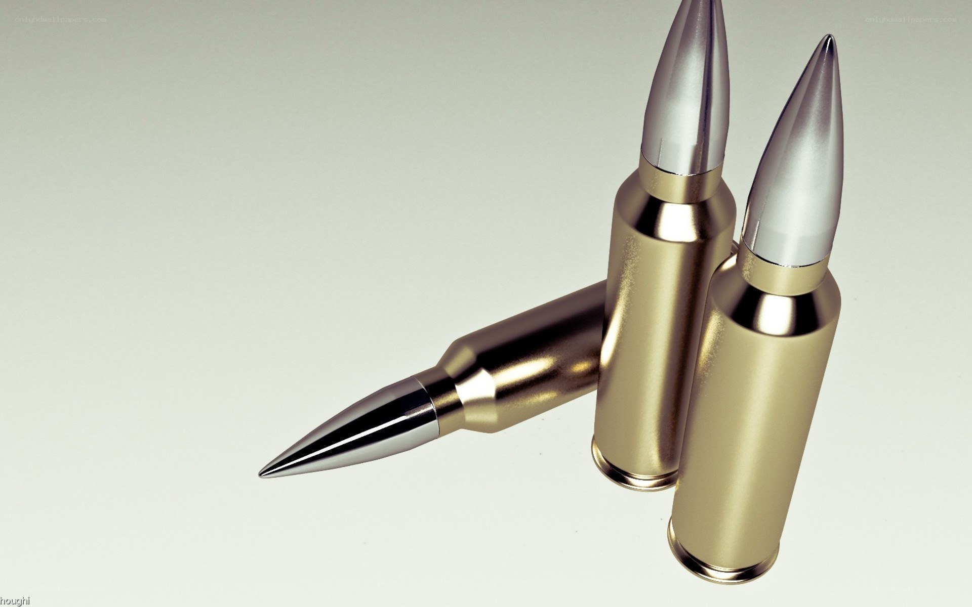 three bullets on white surface