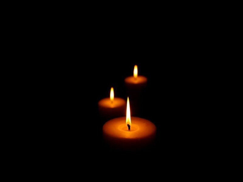 Three candles in the dark