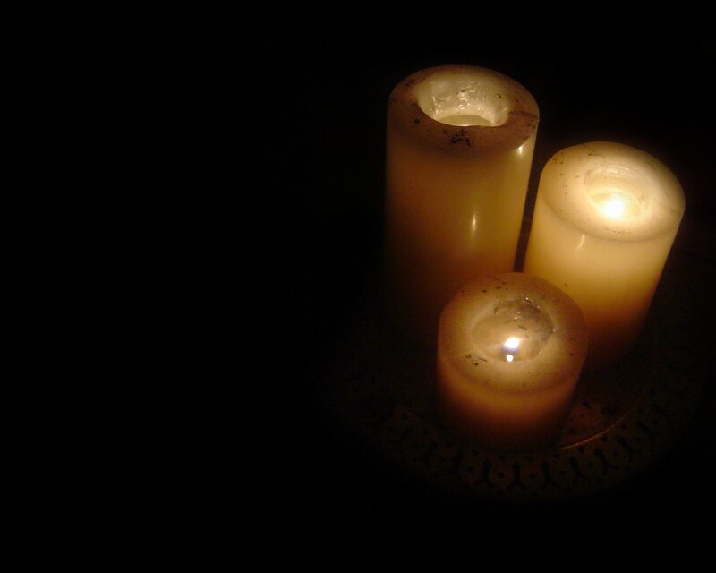 Three candles in the dark