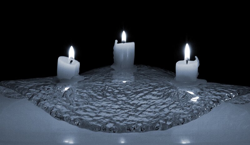 Three Candles on Wax
