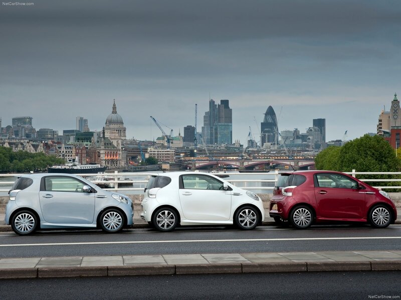 Three cars on a bridge in London