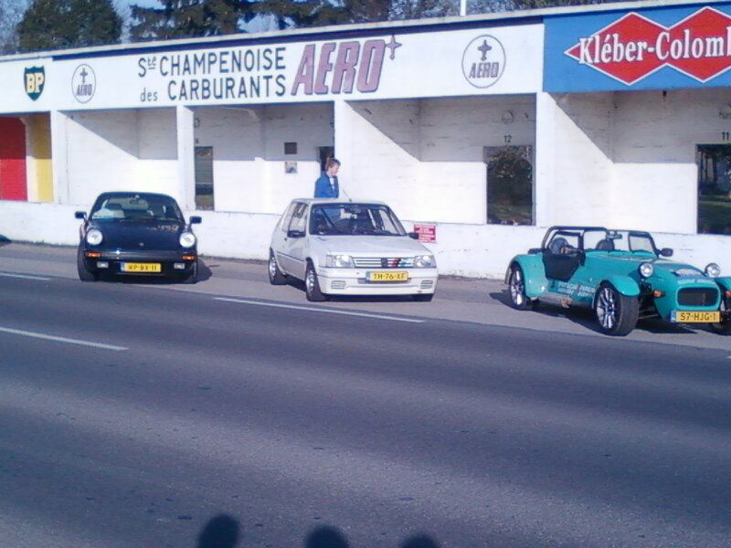 Three Cars on a Road