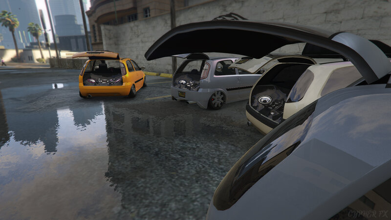 Three Cars with Open Trunks