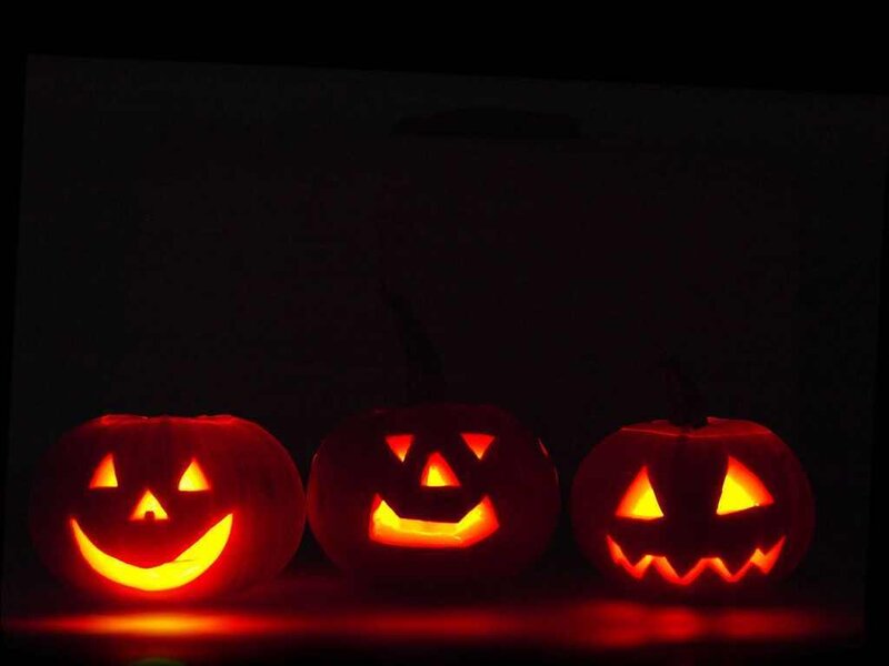 Three Carved Pumpkins — Orange, Festive