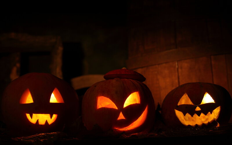 Three Carved Pumpkins — Orange, Spooky, Night, Photograph