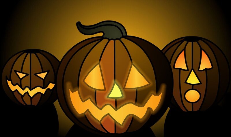 Three Carved Pumpkins — Orange, Spooky, Night