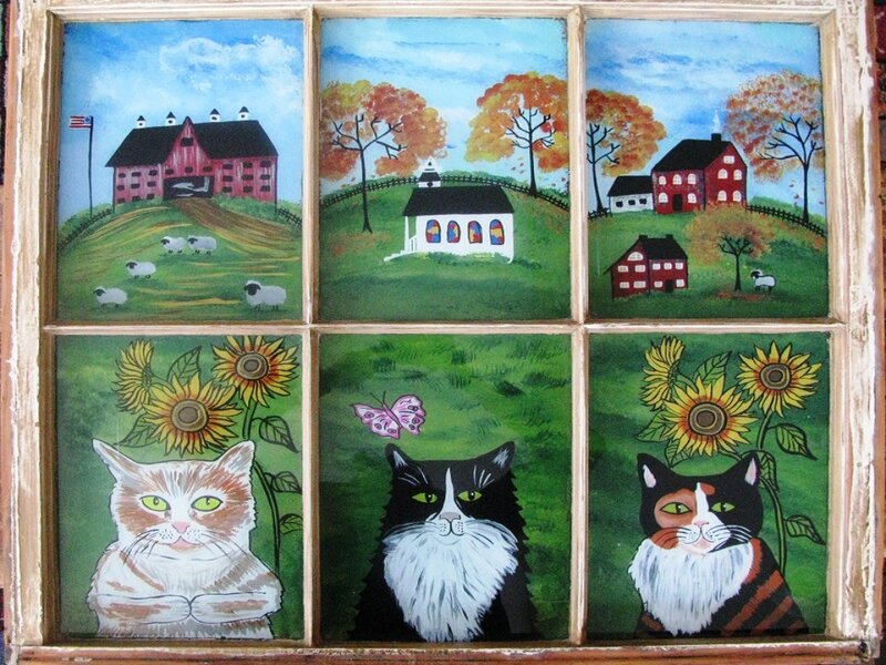 Three Cats in a Window