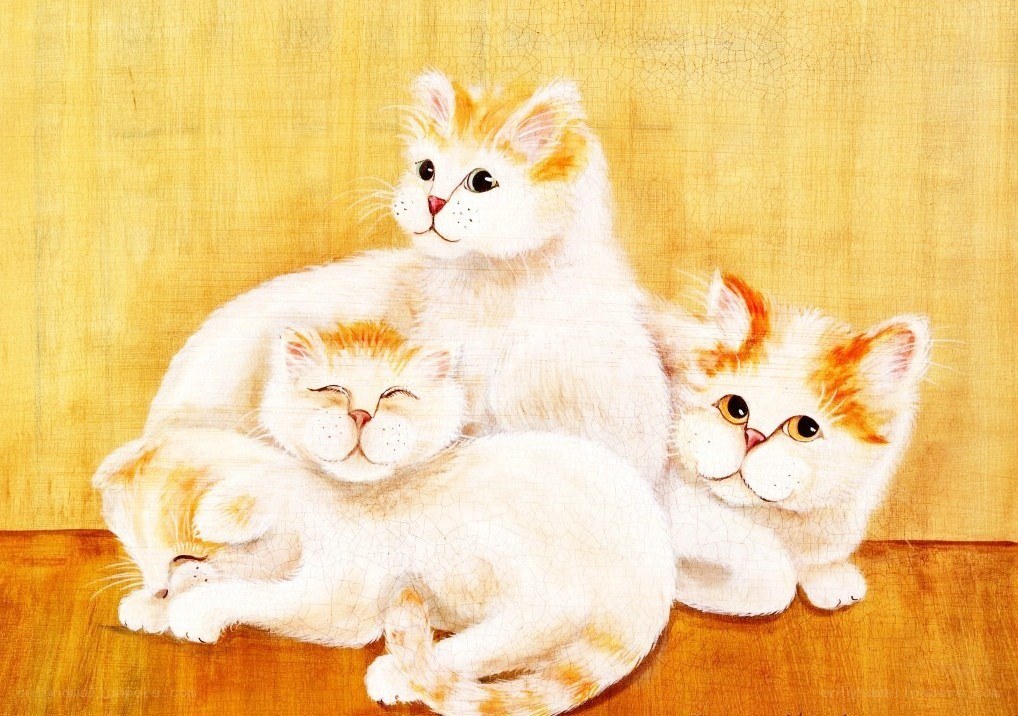 Three cats on a wooden surface