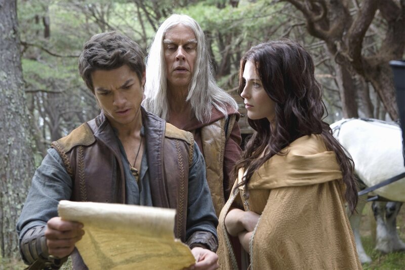 Three characters in a forest