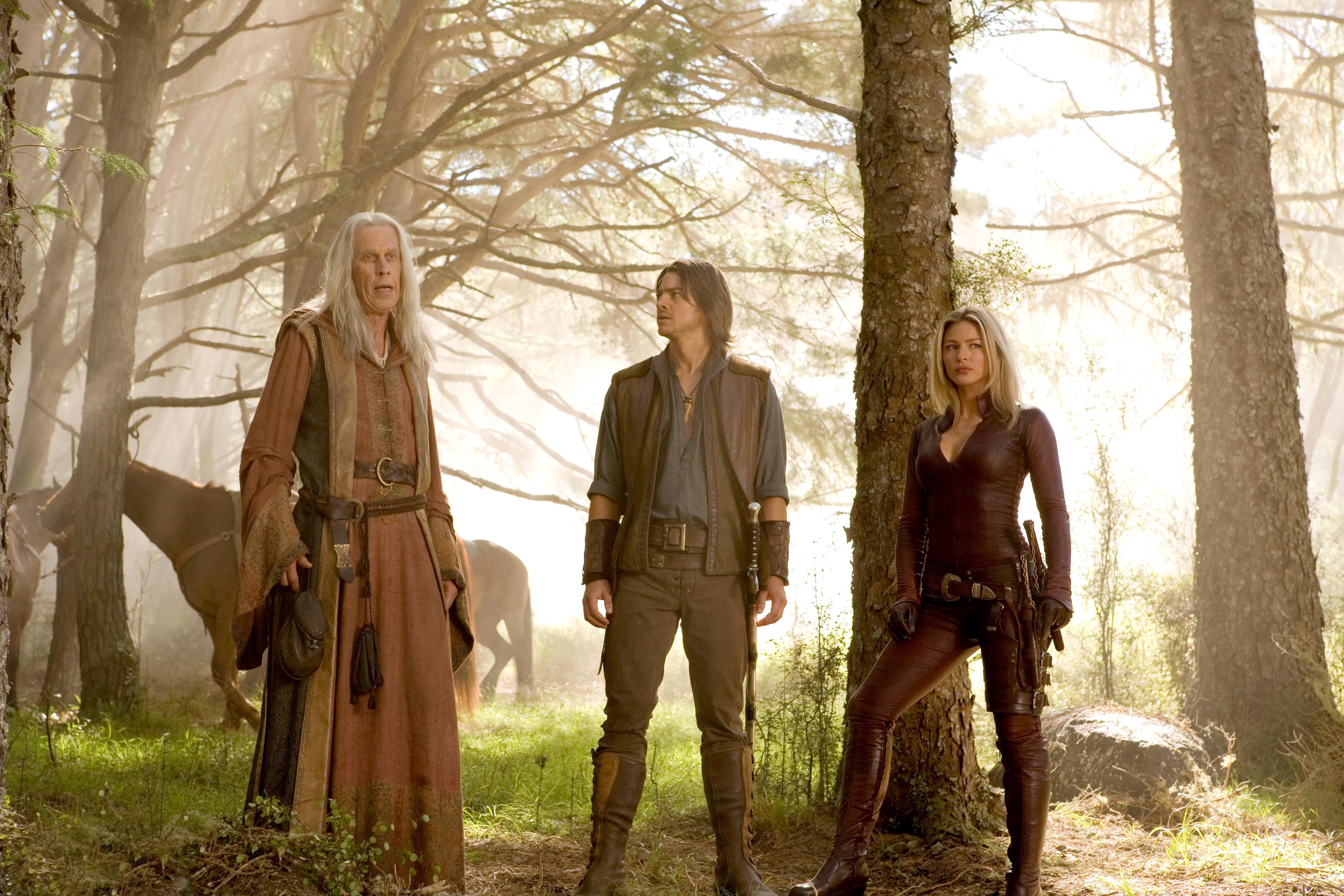 Three characters in a forest scene