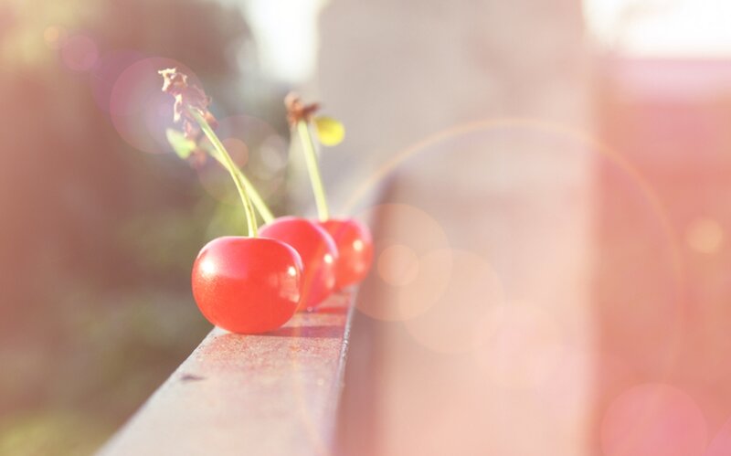 Three Cherries on a Ledge