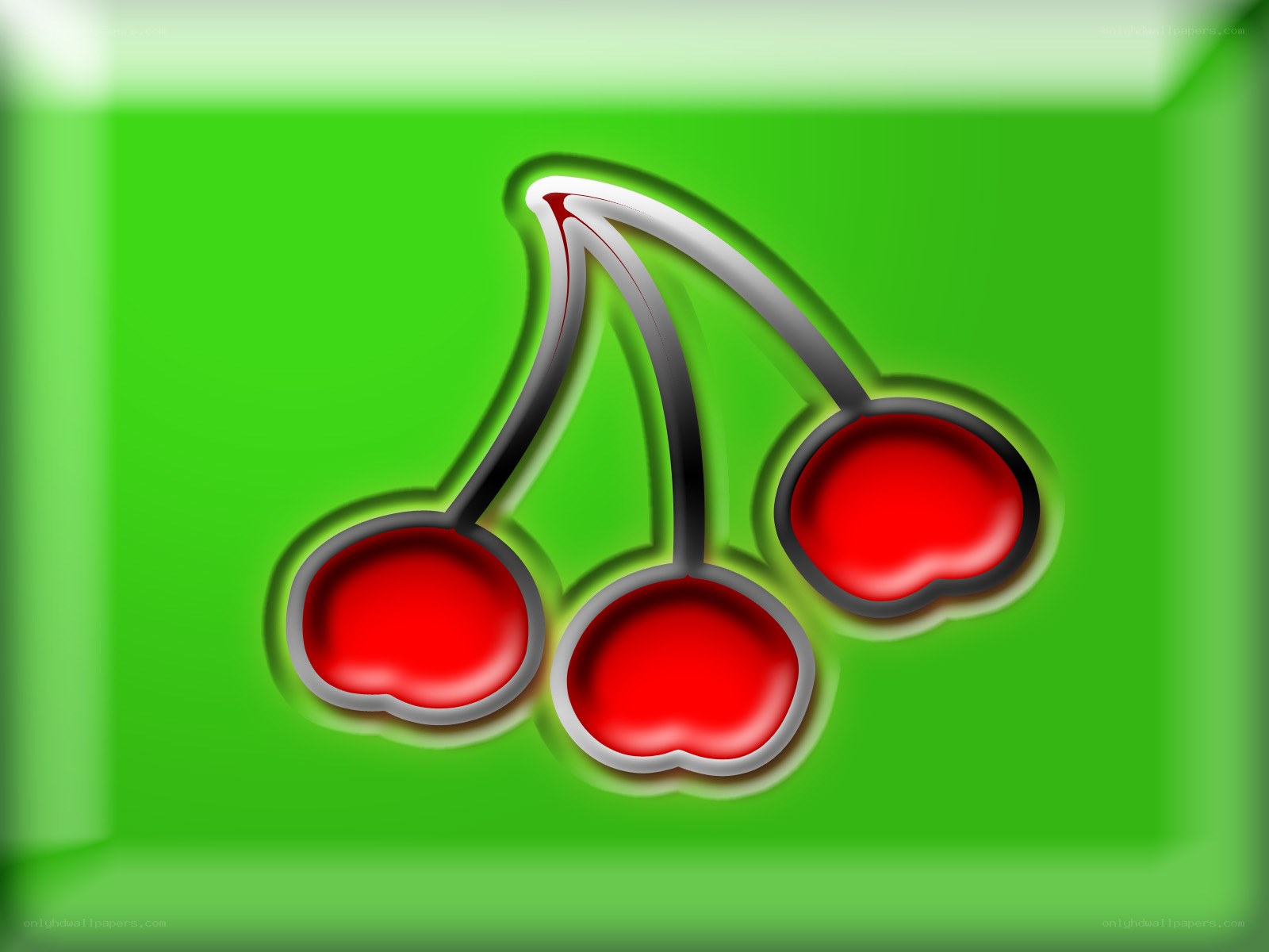 three cherries on green background