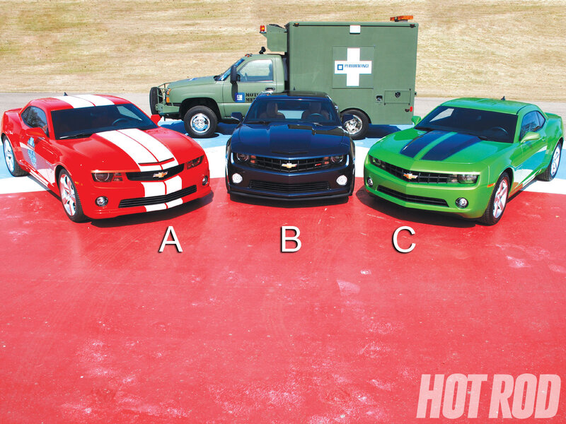 Three Chevrolet Camaro Cars