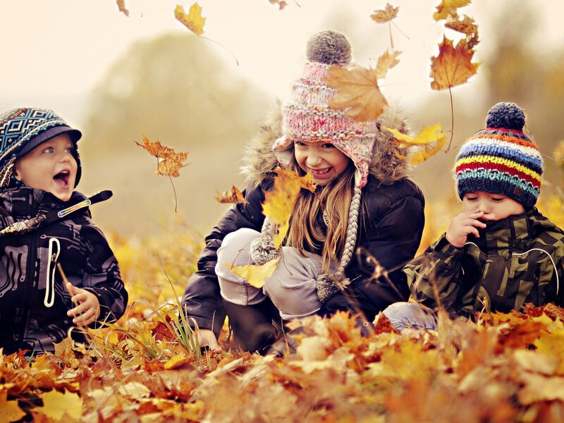 Three Children in Leaves — Yellow