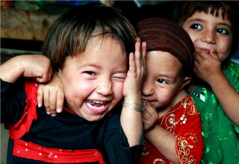 Three Children Laughing
