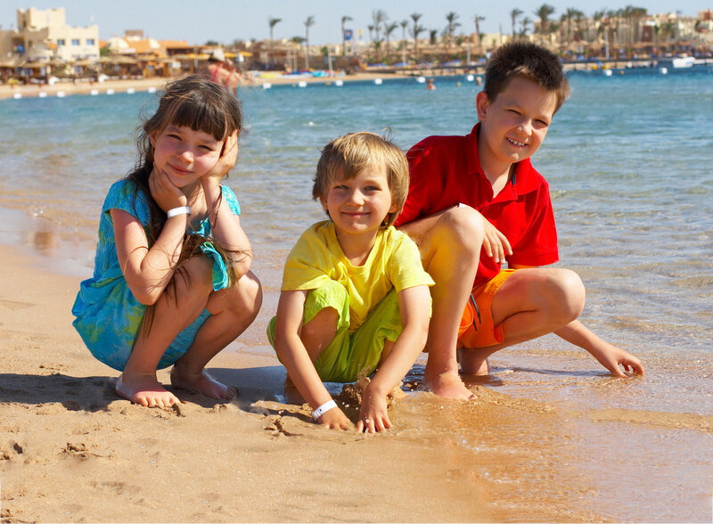 Three Children on Beach — Blue