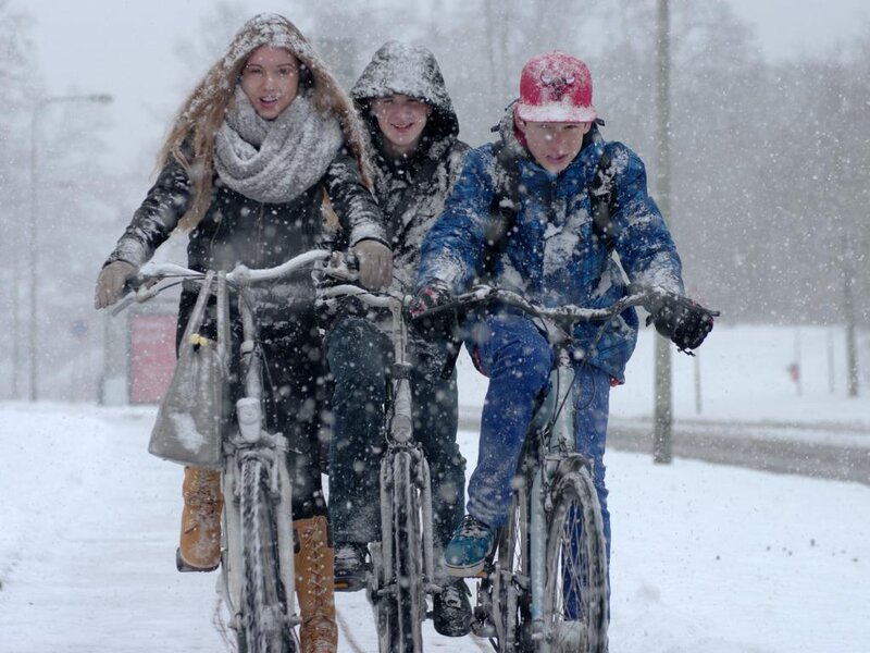 Three Children on Bicycles