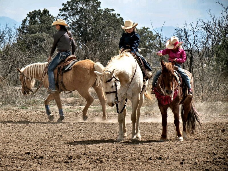 Three Children on Horses