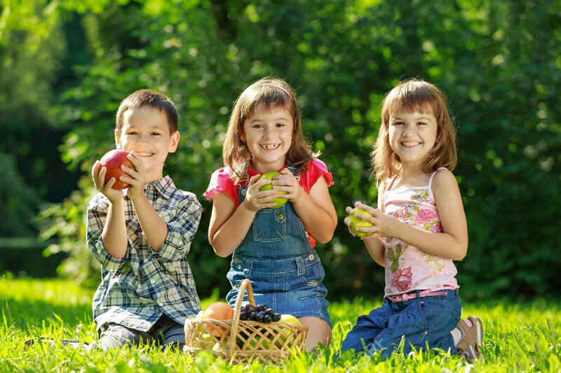 Three Children with Apples