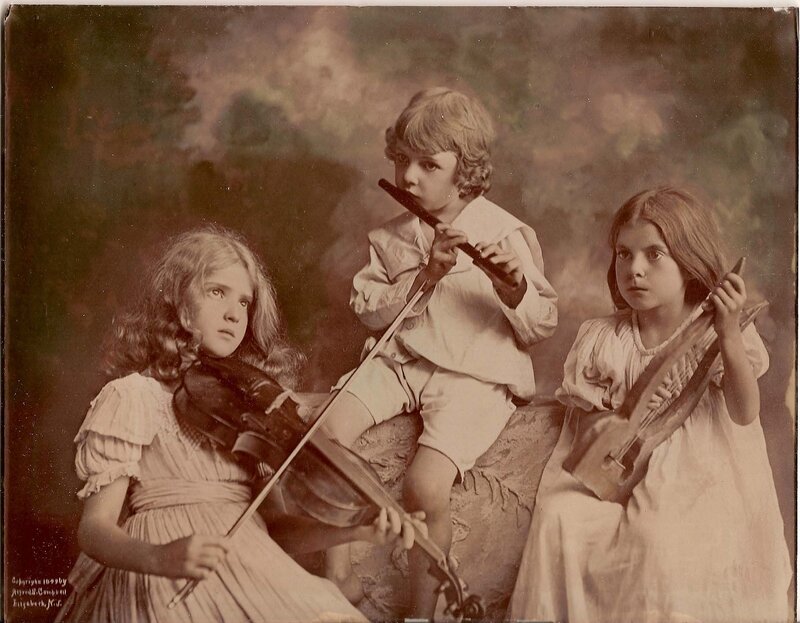 Three Children with Instruments