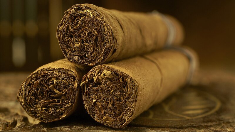 Three Cigars Stacked