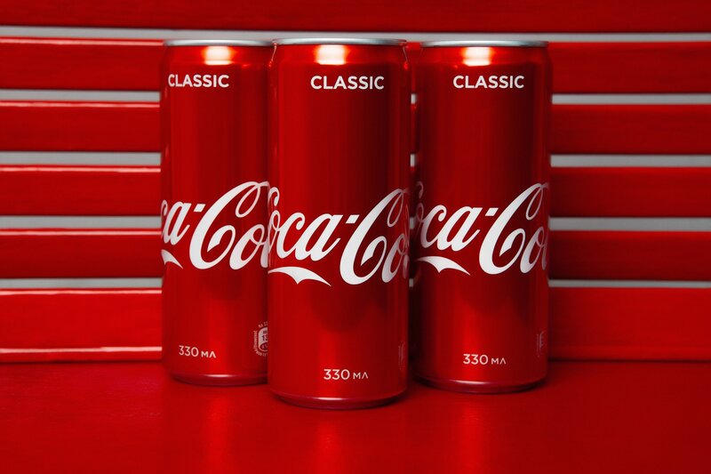 Three Coca-cola Cans