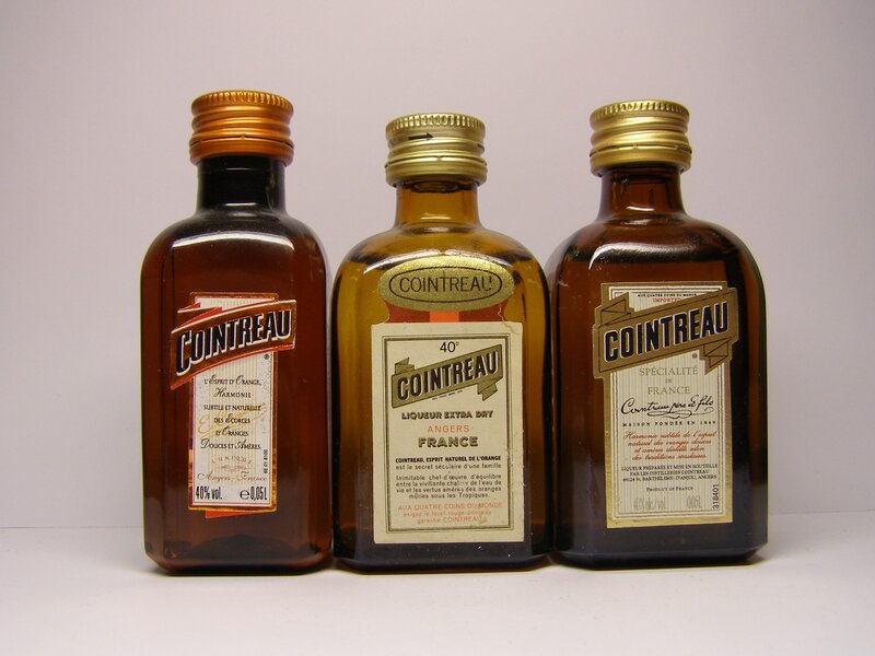 Three Cointreau bottles