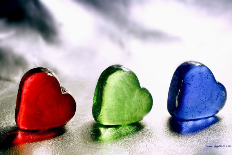 Three colored glass hearts