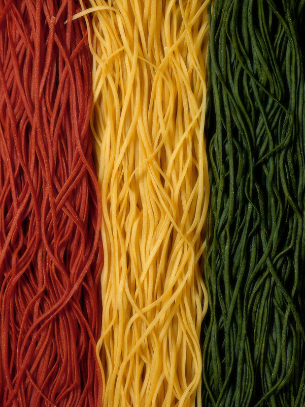 Three colored pasta strands