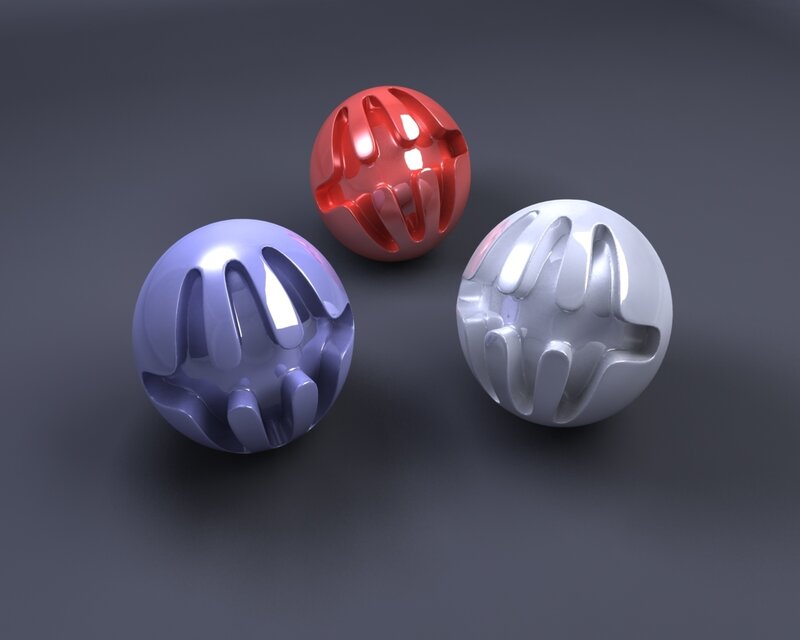 Three colored spheres with hand impressions
