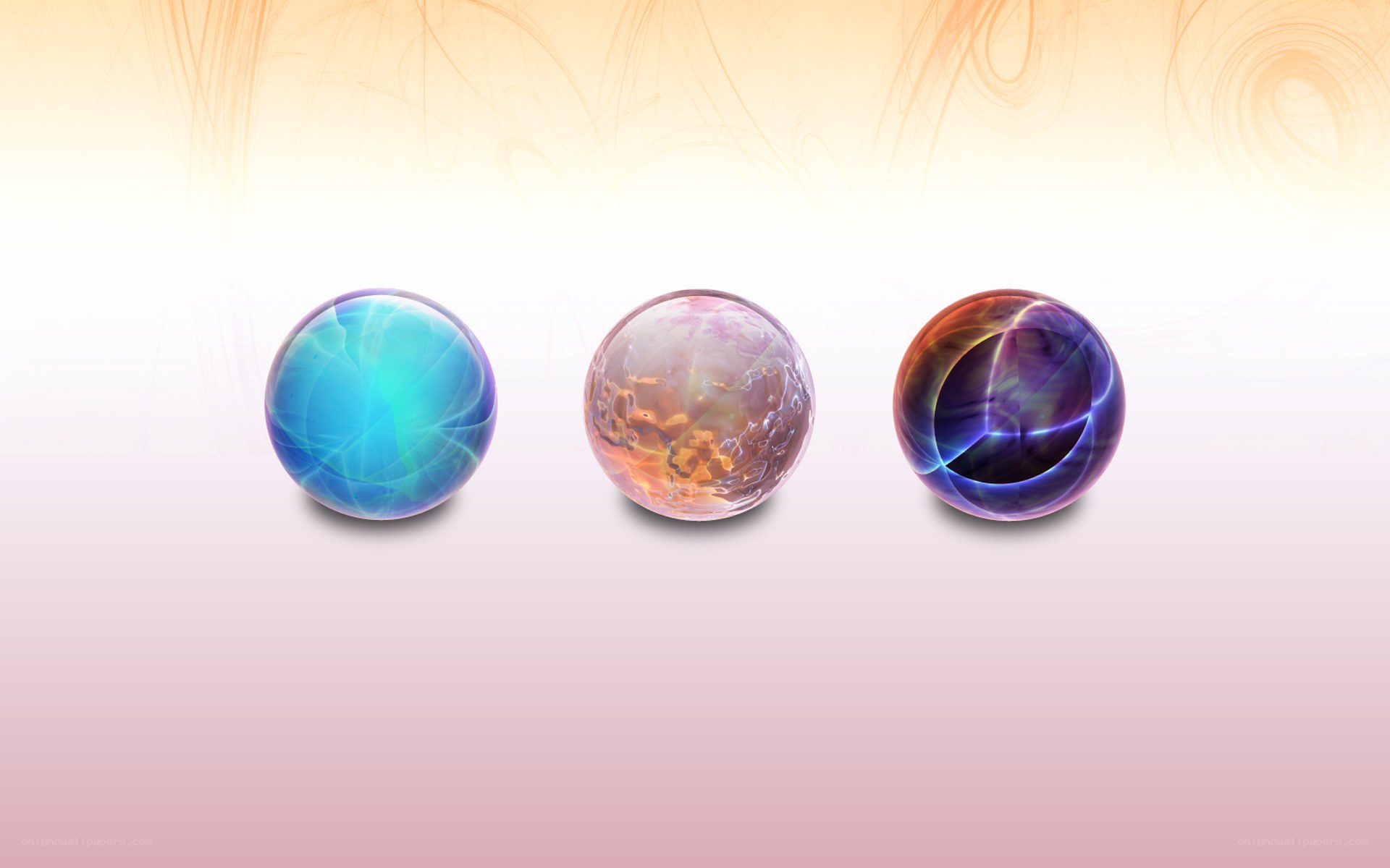 Three colorful glass spheres