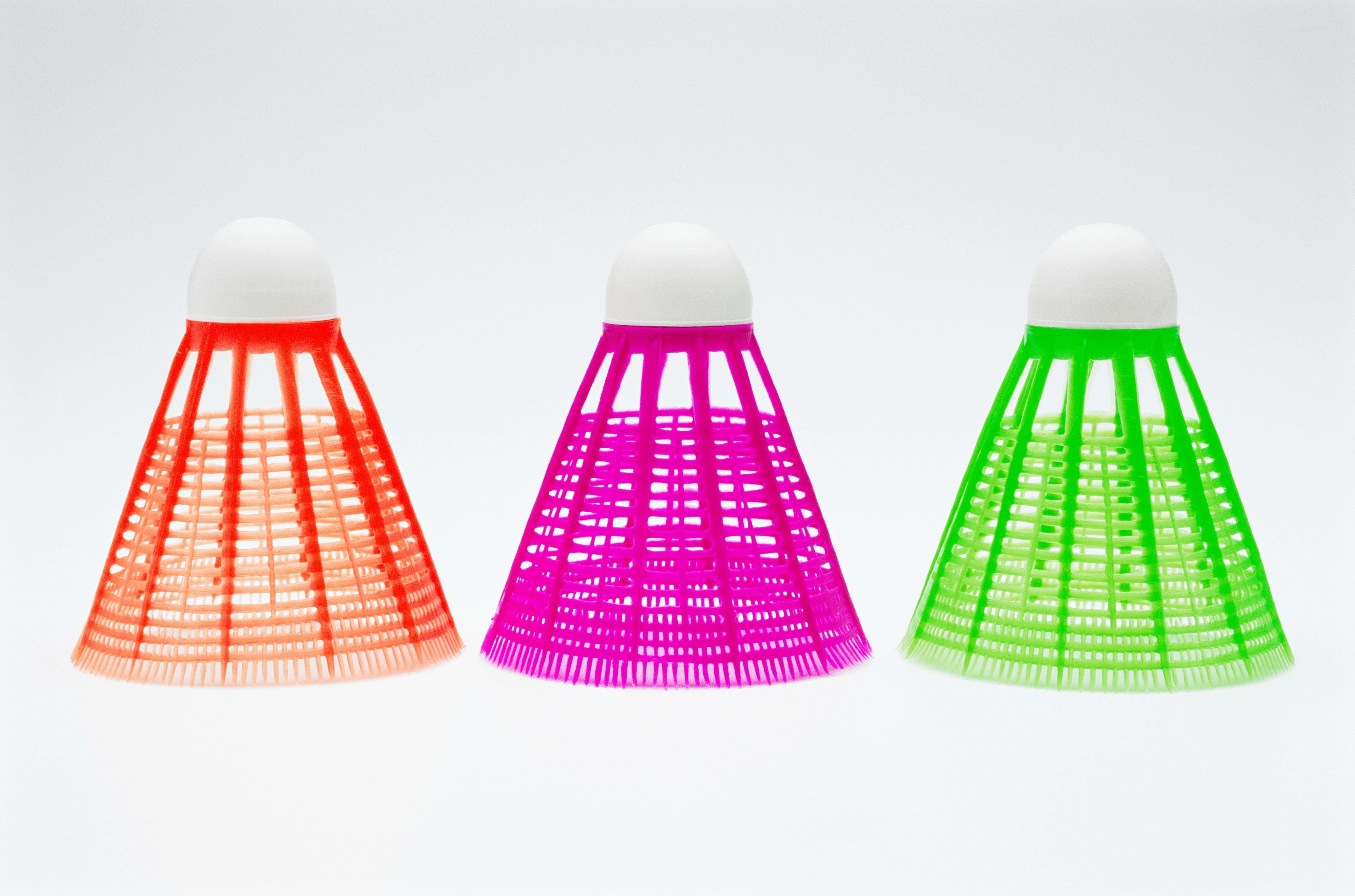 Three colorful shuttlecocks