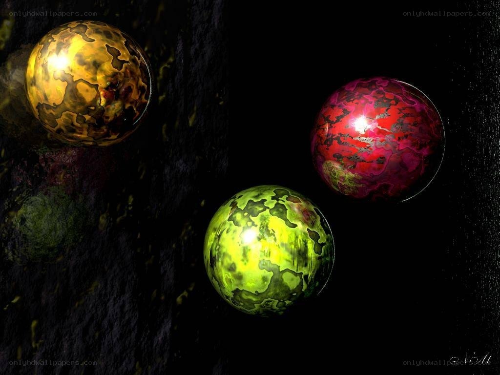 Three colorful spheres in dark space