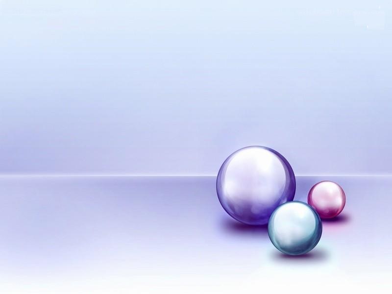 Three colorful spheres on a gradient
