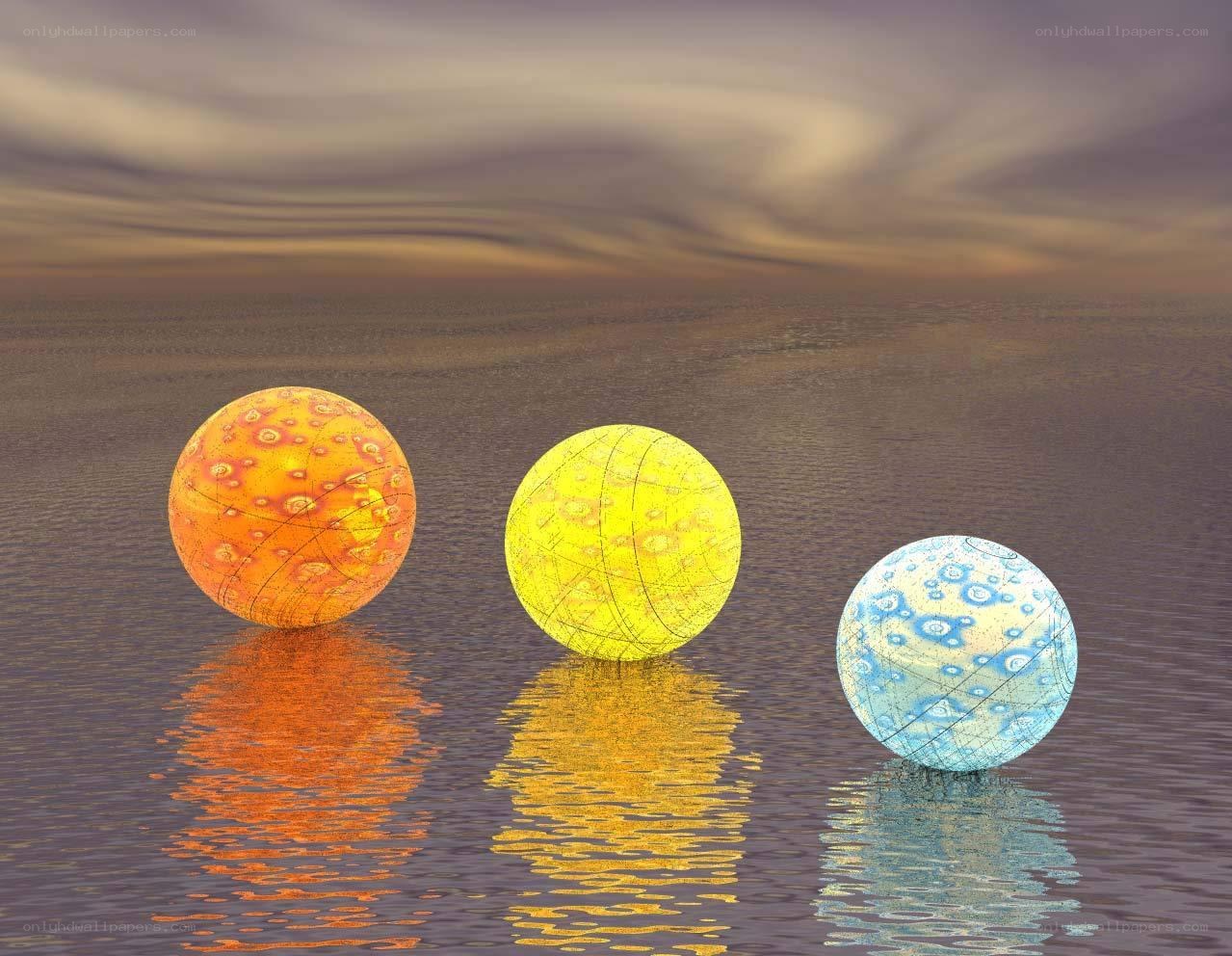 Three colorful spheres on water