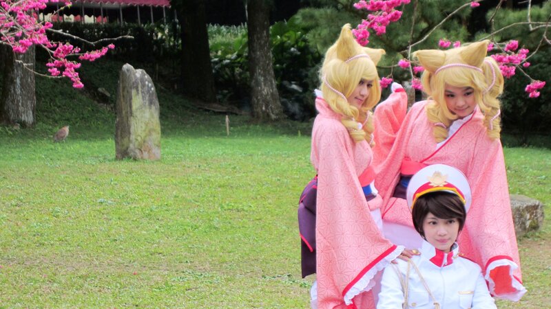 Three Cosplayers in Garden