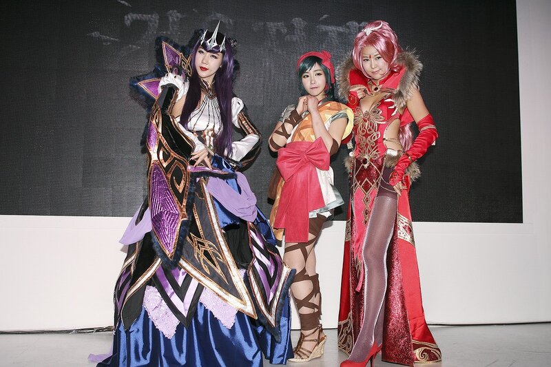 Three Cosplayers on Stage