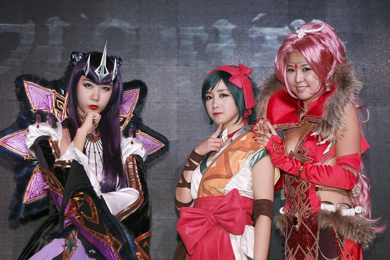 Three Cosplayers Posing — Purple