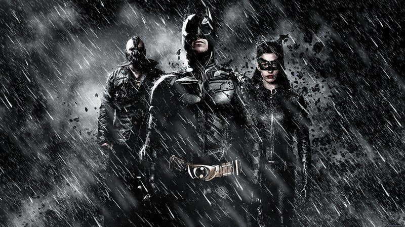 Three Costumed Figures in Rain