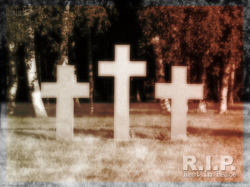 Three crosses in a cemetery