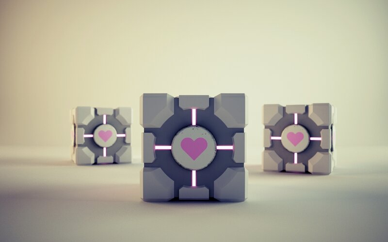 three cubes with heart symbols