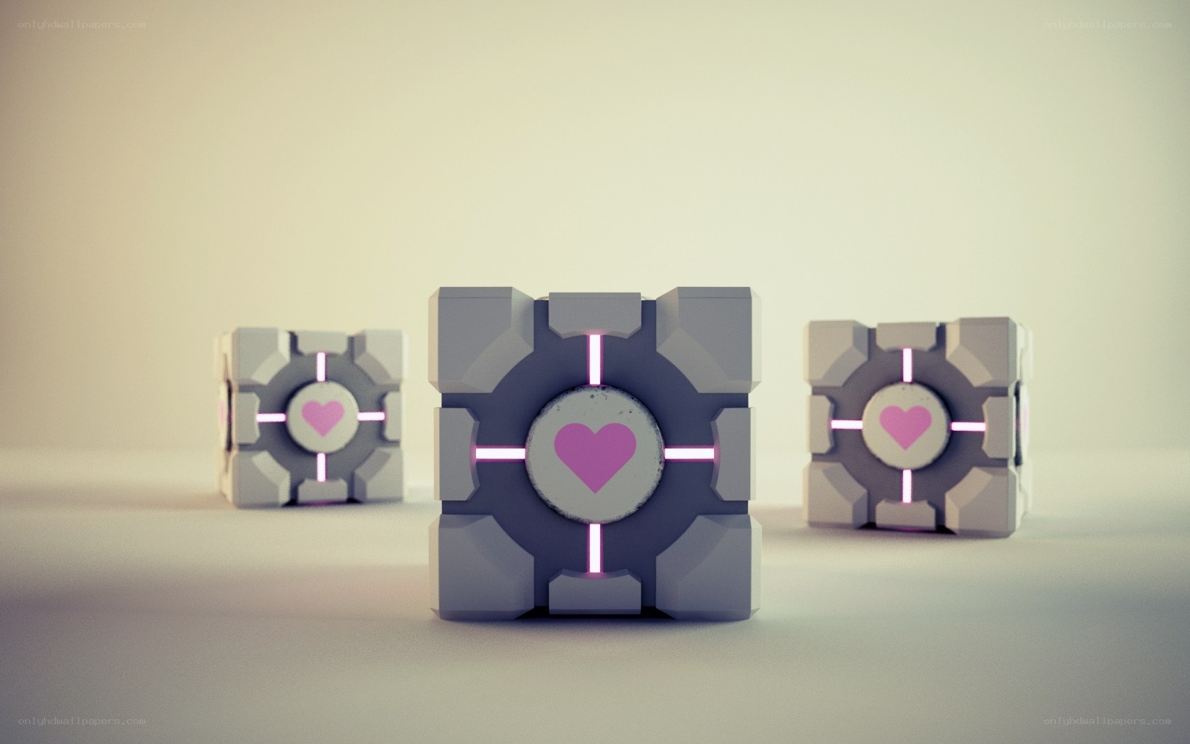 three cubes with heart symbols