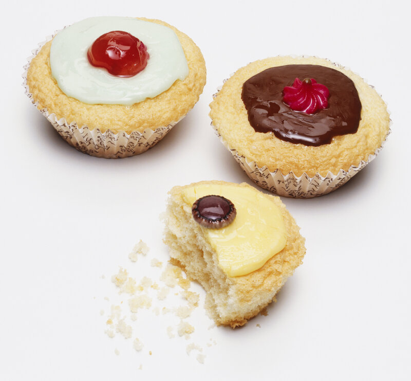 Three cupcakes with toppings