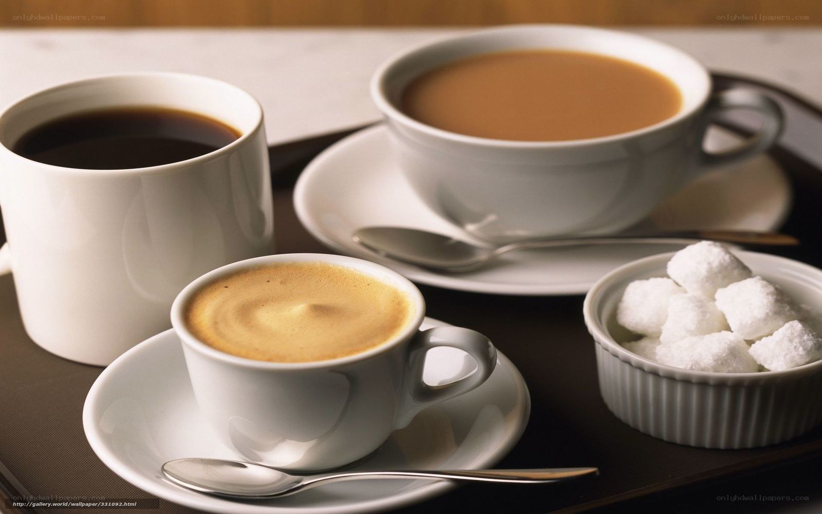 three cups of coffee on tray