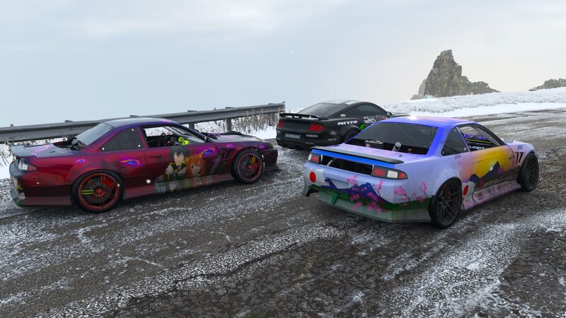 Three Custom Cars on Road