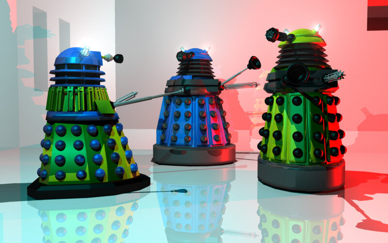 Three Daleks in a studio