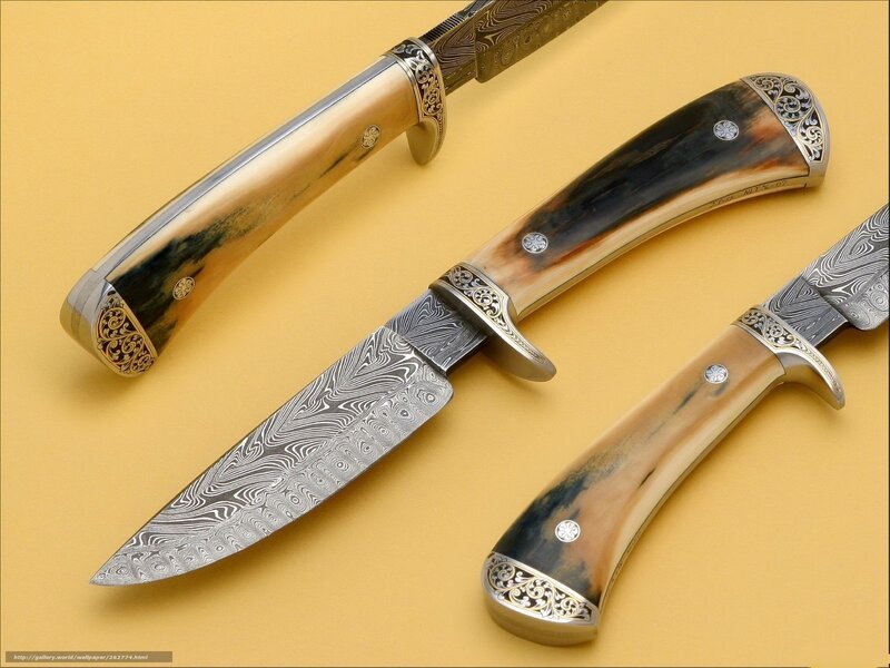 Three Damascus Knives
