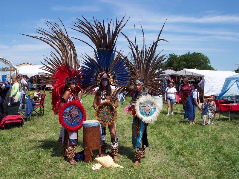 Three Dancers in Feathered Headdresses