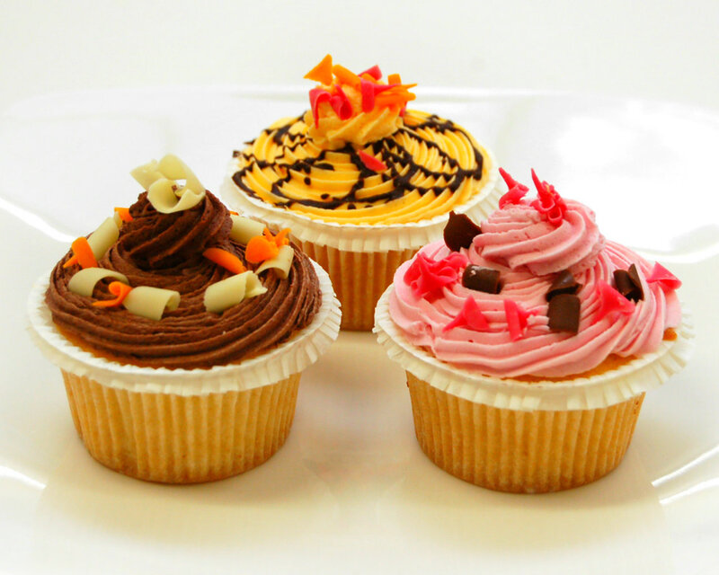 Three Decorated Cupcakes — Brown