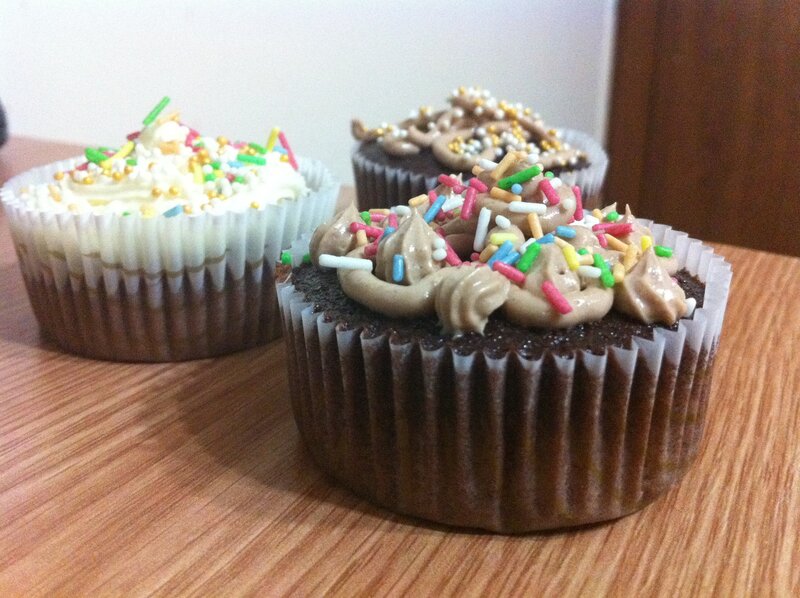 three decorated cupcakes